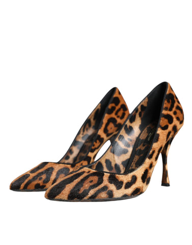Brown leopard calf hair heels pumps by Dolce & Gabbana, featuring pointed toes and stylish animal print design.