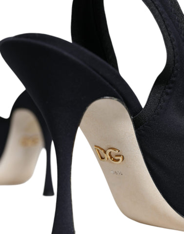 Black jersey stretch heels slingback shoes by Dolce & Gabbana featuring a sleek design and pointed toe.