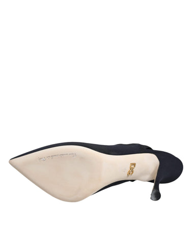 Black jersey stretch slingback heels by Dolce & Gabbana, featuring a sleek design and elegant heel for stylish footwear.