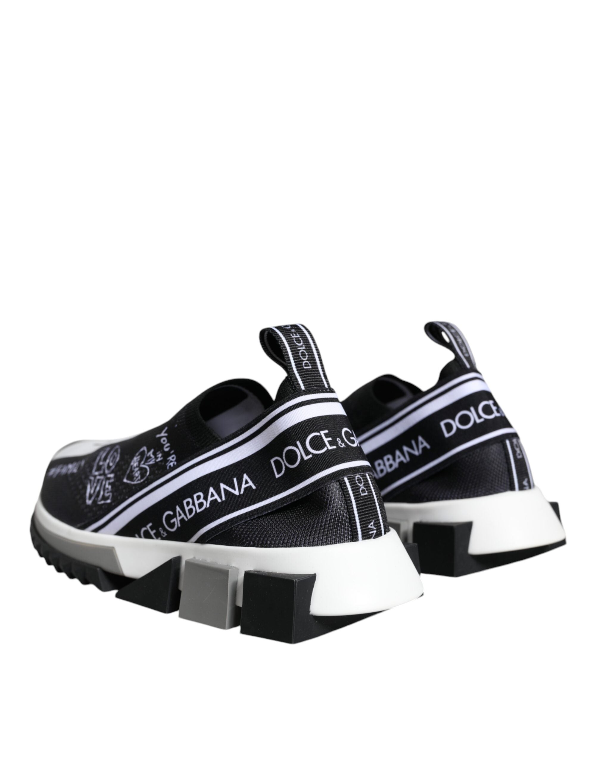 Black and white Dolce & Gabbana Sorrento low top sneakers with stylish design and lace-up closure.
