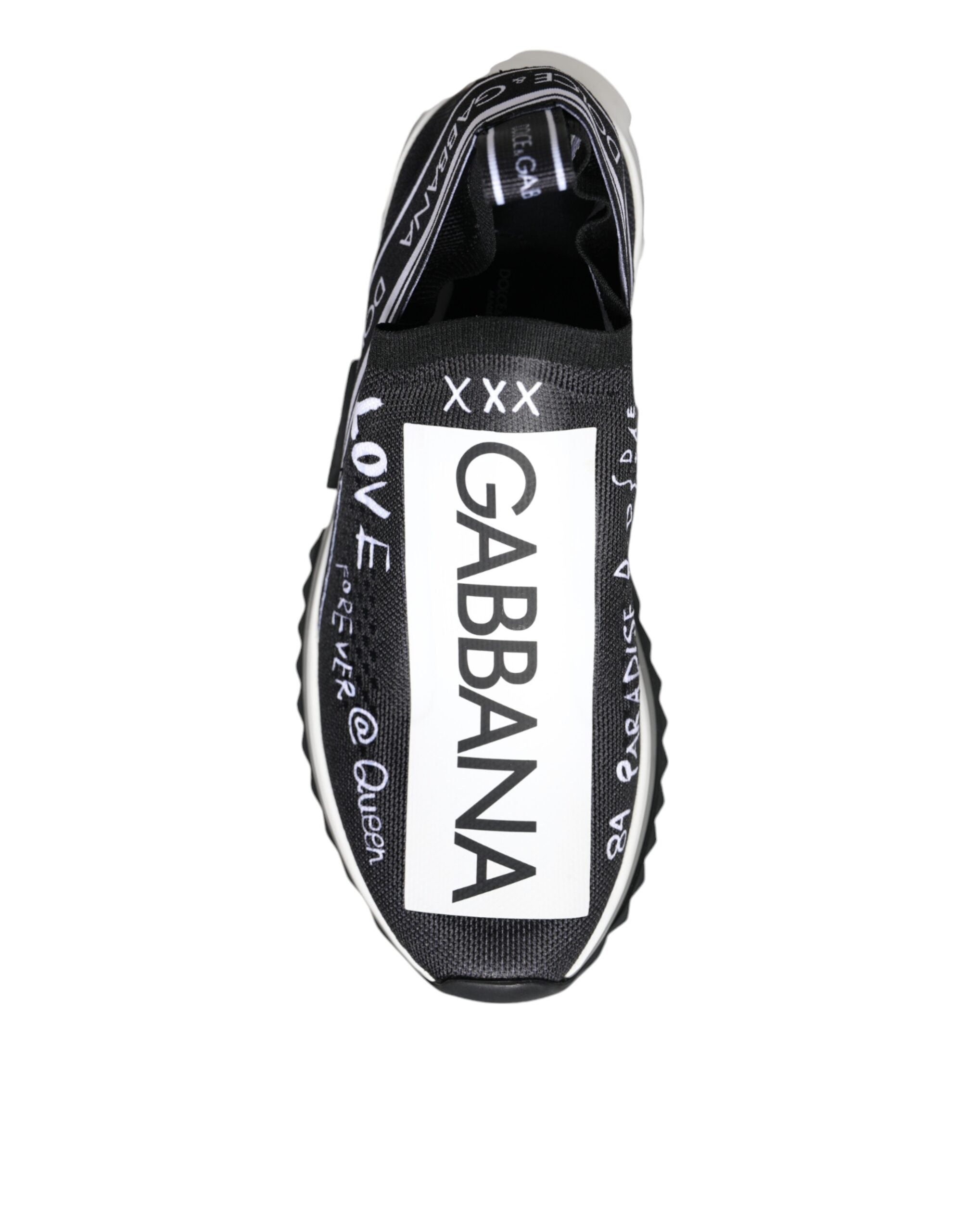 Dolce & Gabbana black and white Sorrento low top sneakers with stylish design and white laces on a plain background.