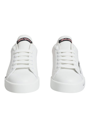 White and pink Dolce & Gabbana Portofino low top sneakers with stylish design and comfortable sole.