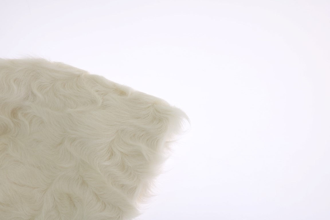 White Xiangao lamb fur beanie by Dolce & Gabbana featuring soft, plush lamb fur and a cozy knit design.