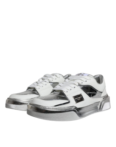 White silver leather low top sneakers by Dolce & Gabbana, featuring sleek design and comfortable casual footwear.
