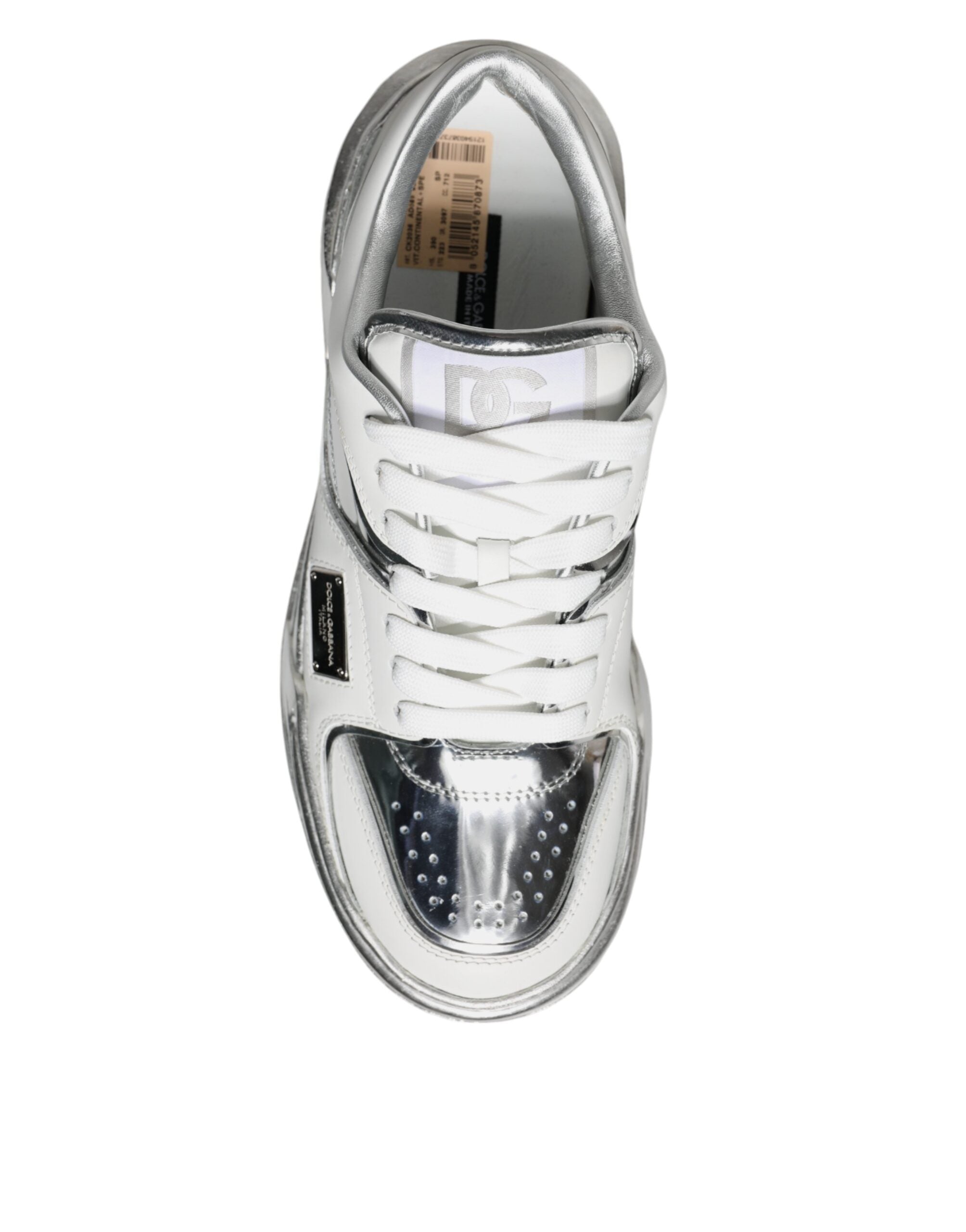 White silver leather low-top sneakers by Dolce & Gabbana, featuring stylish design and comfortable sneaker profile.
