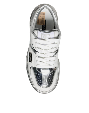 White silver leather low-top sneakers by Dolce & Gabbana, featuring stylish design and comfortable sneaker profile.