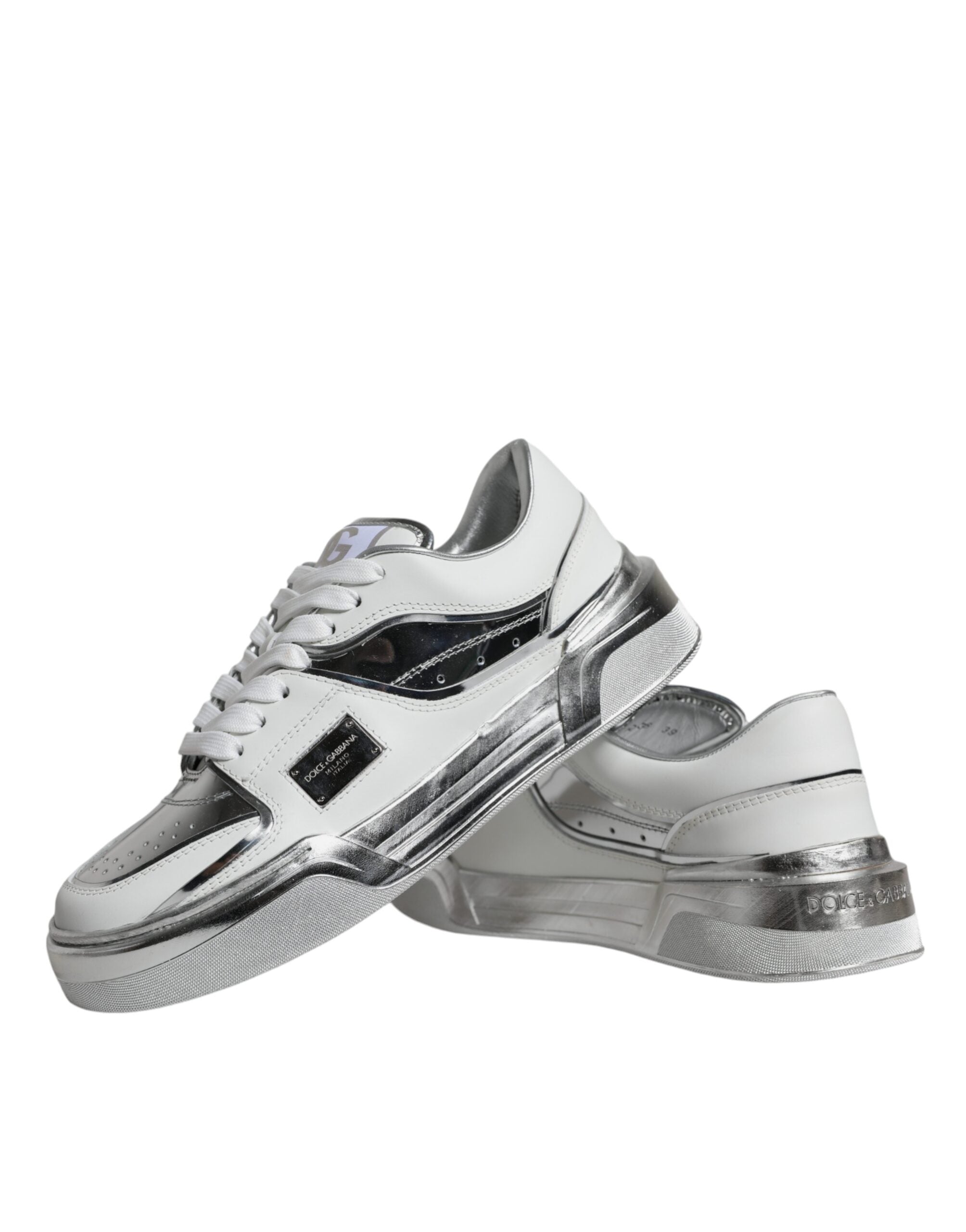 White silver leather low top sneakers by Dolce & Gabbana with sleek design and lace-up closure.