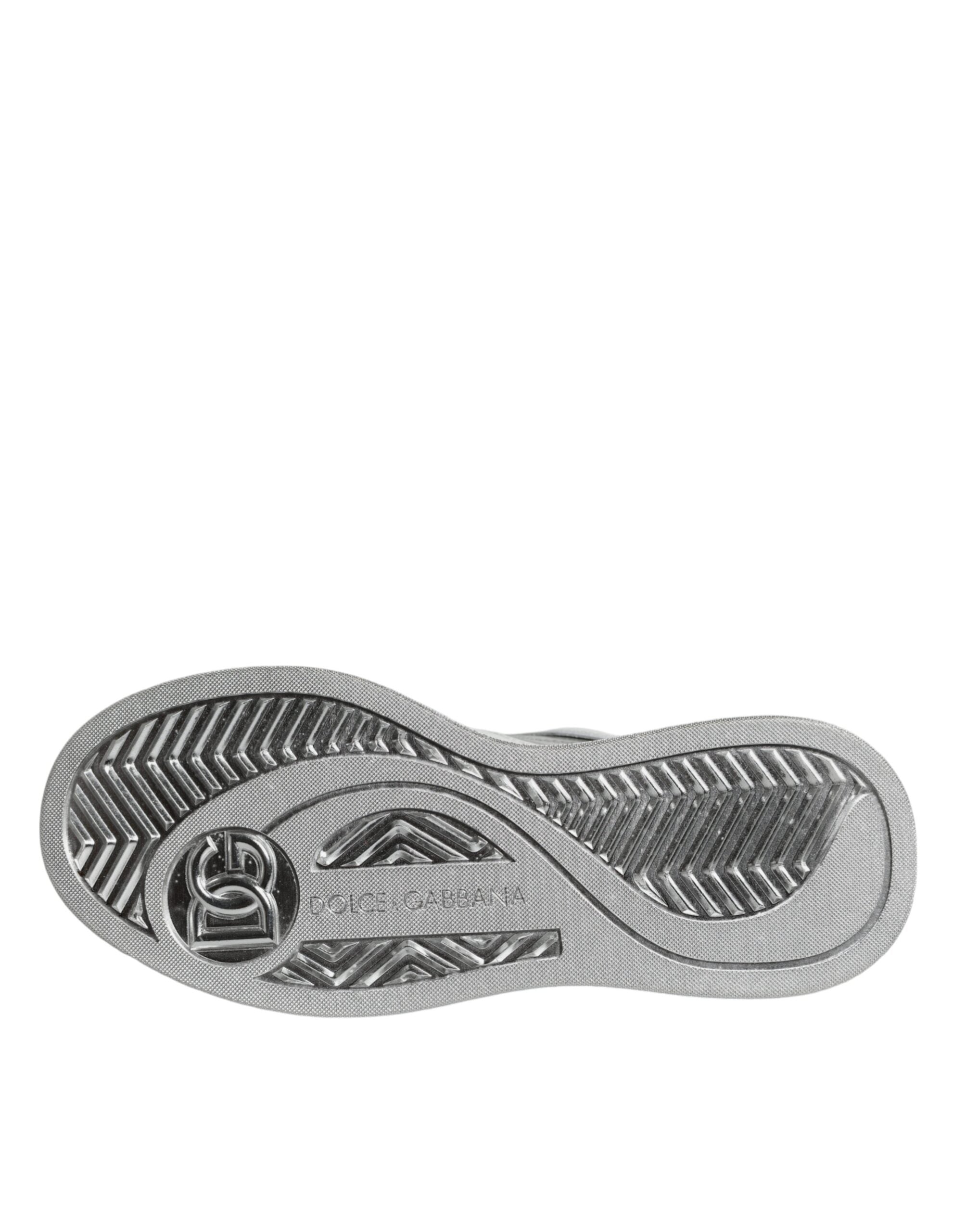 White silver leather low-top sneakers from Dolce & Gabbana with stylish design and sporty laces.