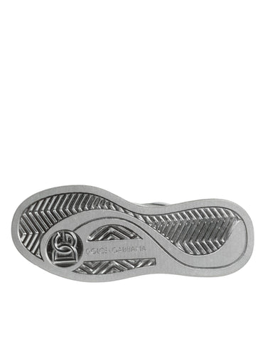 White silver leather low-top sneakers from Dolce & Gabbana with stylish design and sporty laces.