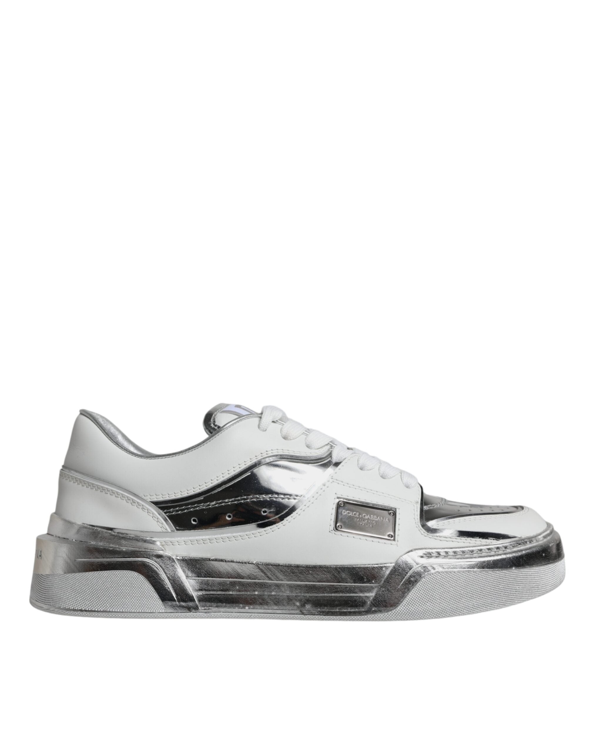 White silver leather low top sneakers by Dolce & Gabbana, stylish shoes with sleek design and lace-up closure.