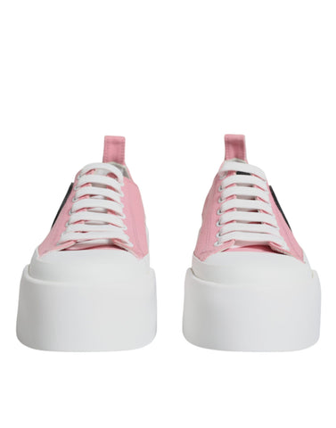 Pink and white canvas low-top sneakers with logo detail from Dolce & Gabbana, featuring a stylish and casual design.