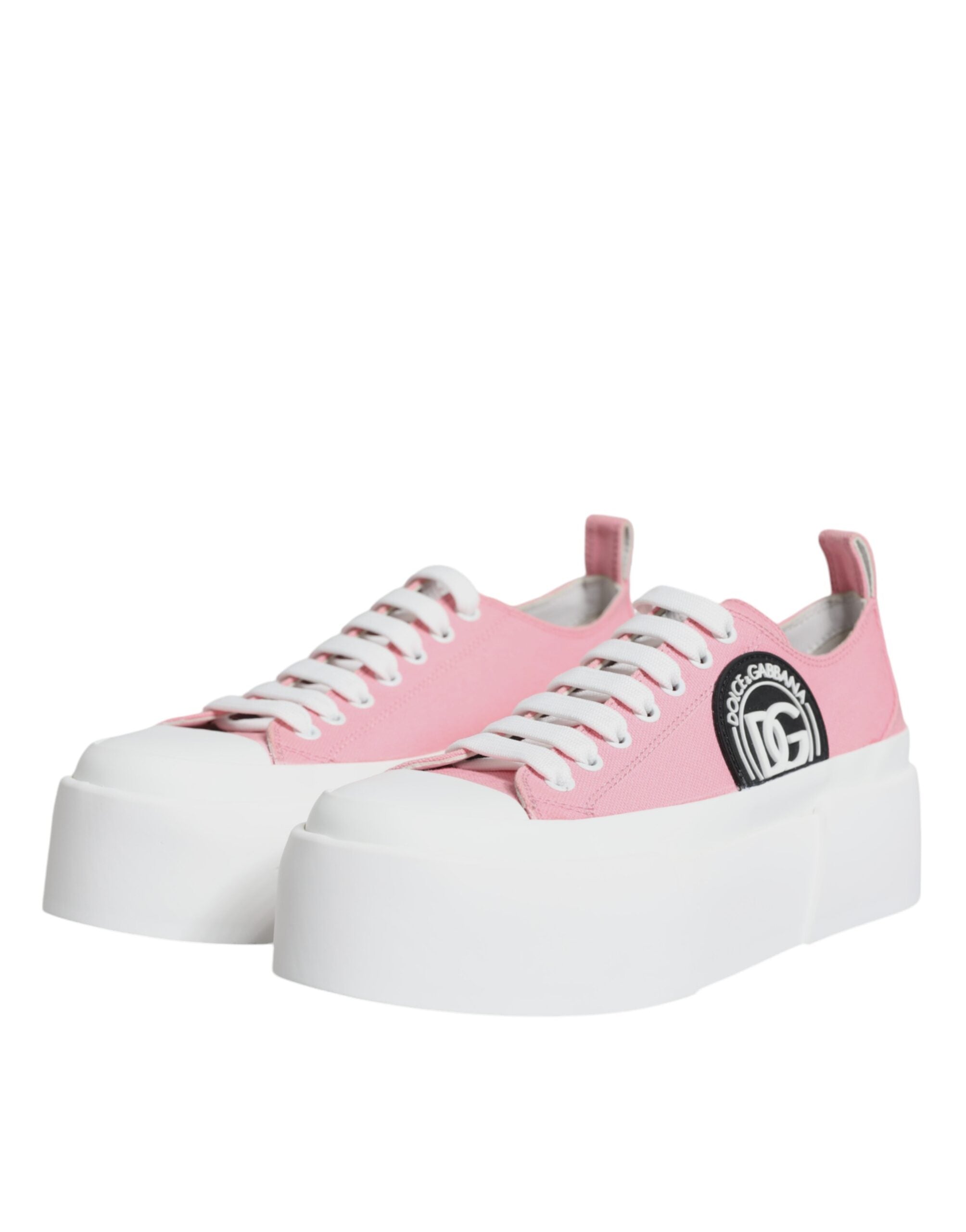 Pink and white canvas low-top sneakers from Dolce & Gabbana with logo detail, casual footwear for everyday wear.