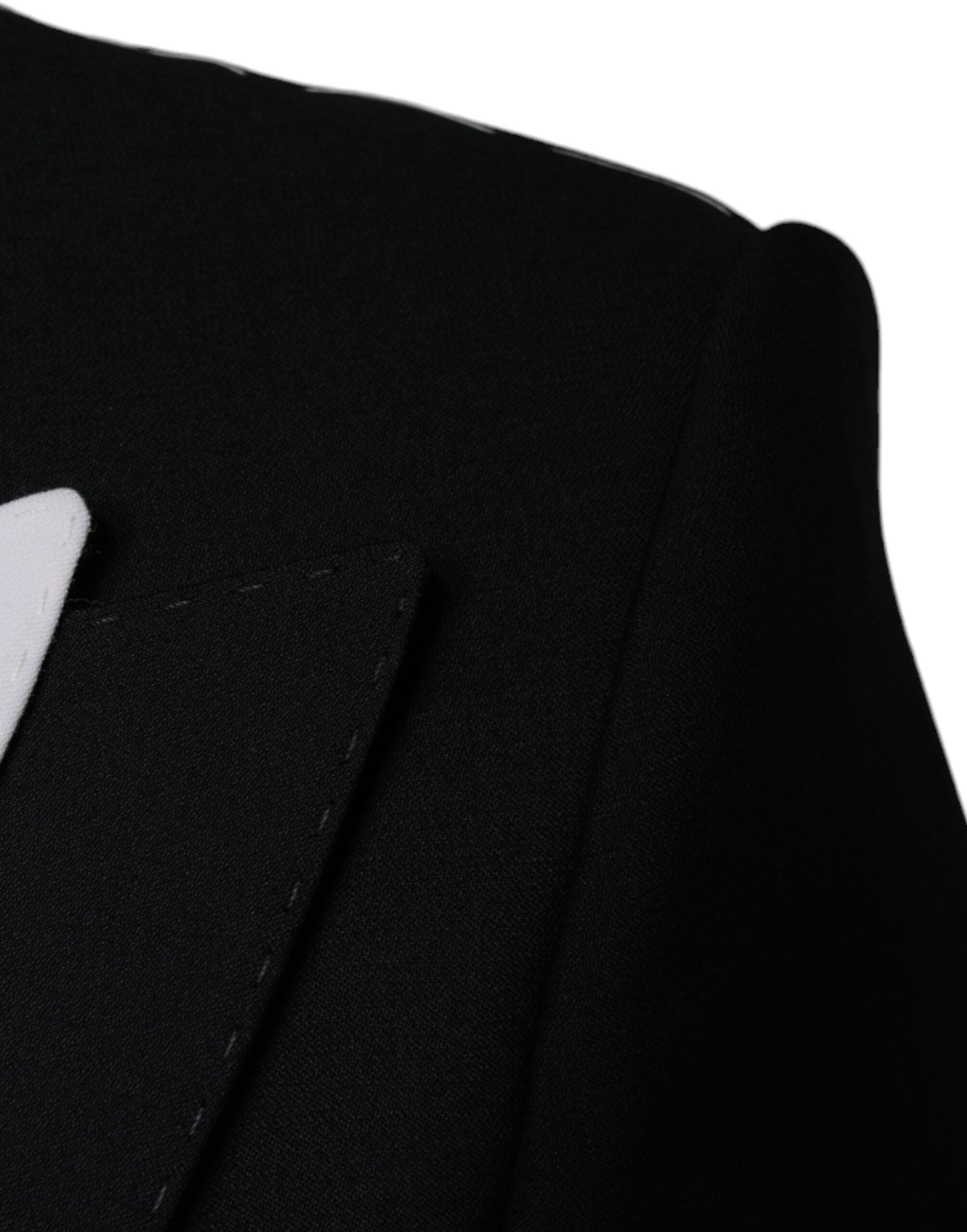 Black and white Dolce & Gabbana single-breasted dress blazer with notch lapels, tailored fit, and stylish design.