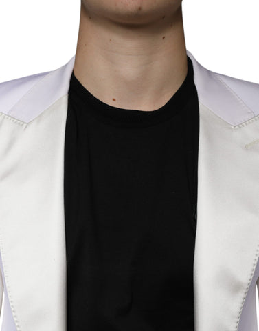 Dolce & Gabbana off-white wool single-breasted dress blazer displayed on a hanger, showcasing classic tailored design and smooth fabric.