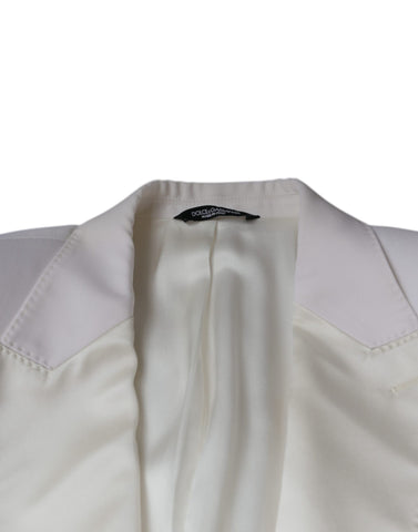 Dolce & Gabbana off white wool single-breasted dress blazer, tailored fit with notch lapels, displayed on a hanger.