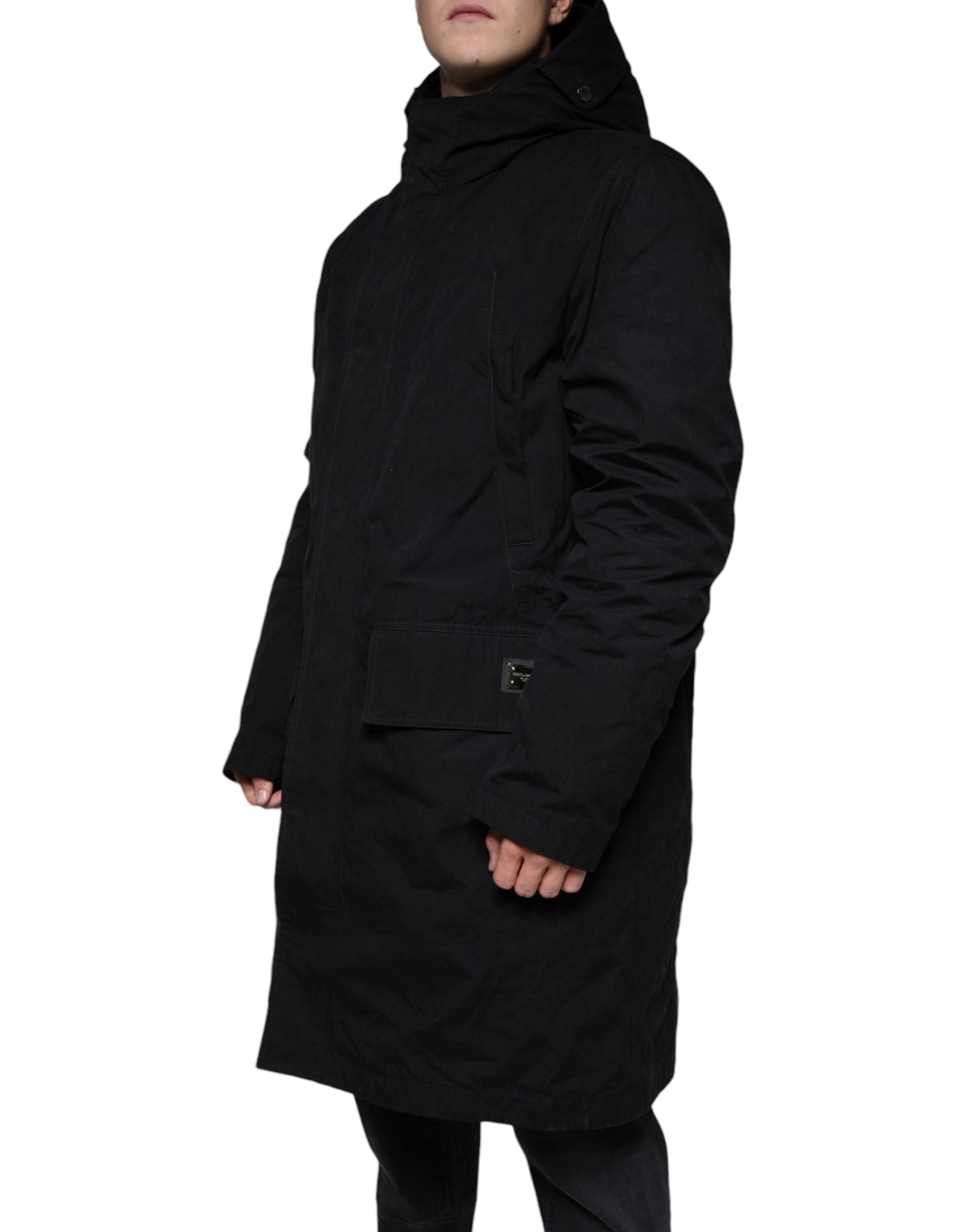 Black hooded trench coat by Dolce & Gabbana featuring cotton fabric and a stylish, tailored design.