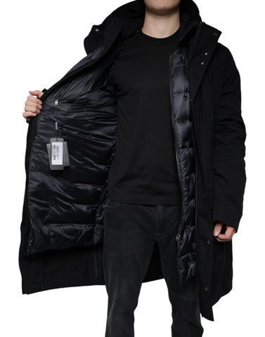 Black hooded parka cotton trench coat jacket by Dolce & Gabbana, featuring a stylish hood and classic design.