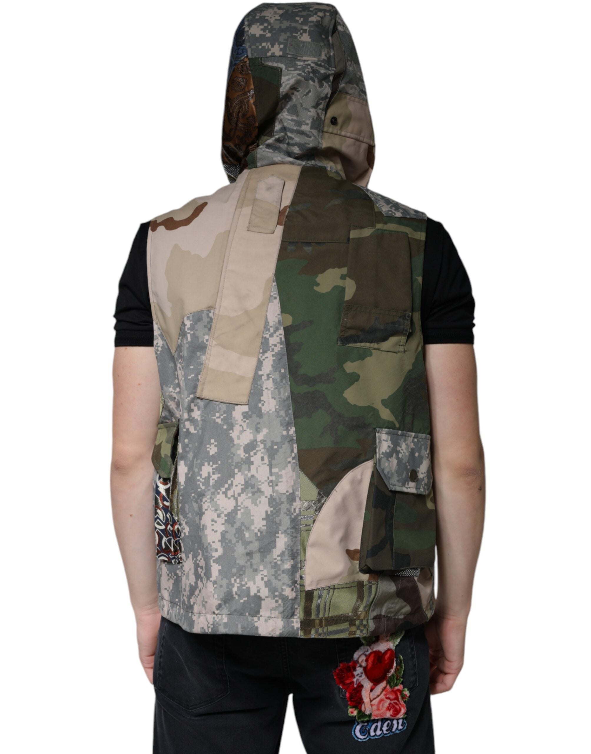 Multicolor patchwork hooded vest jacket by Dolce & Gabbana, featuring vibrant fabric patches and a stylish hooded design.
