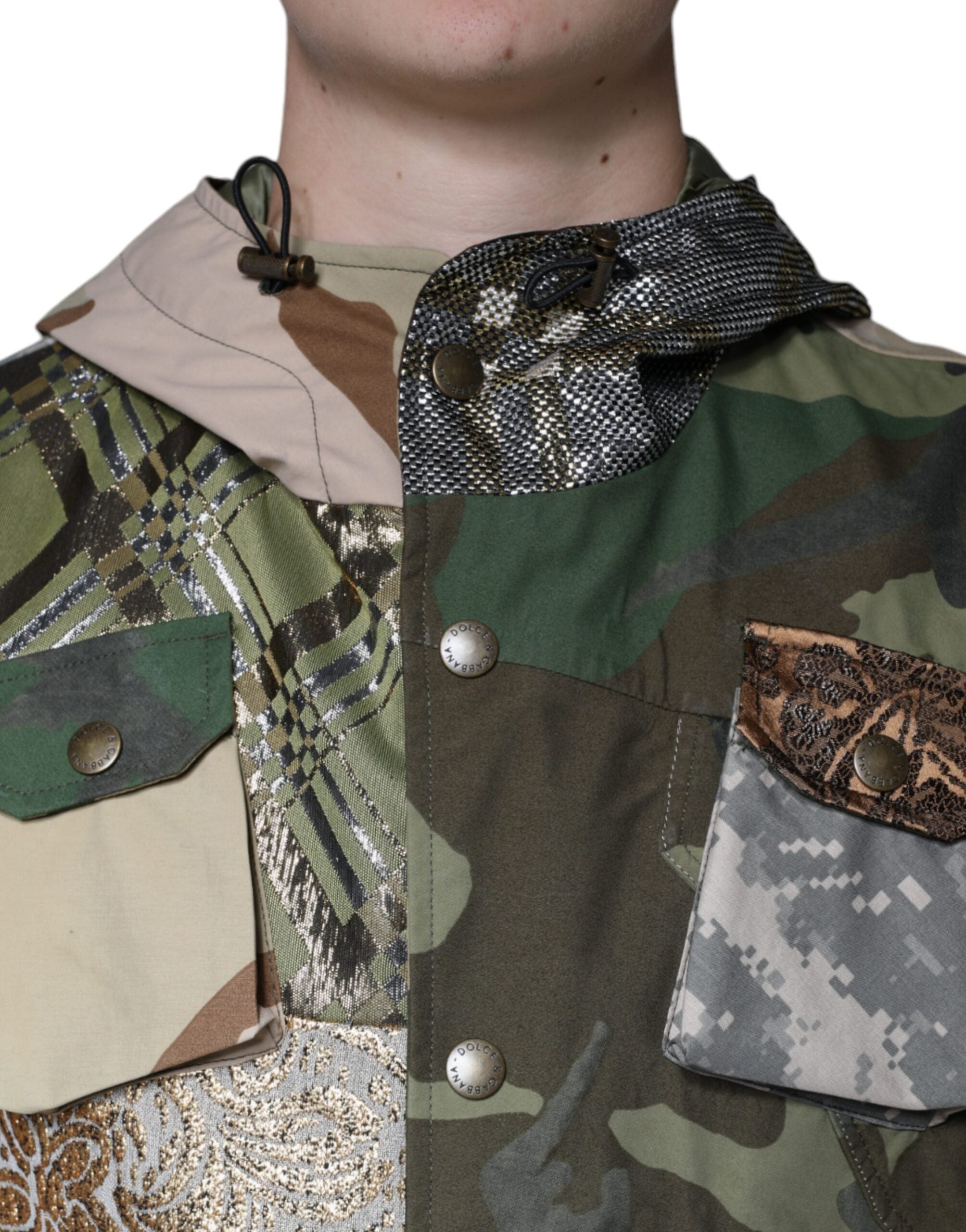 Multicolor patchwork hooded vest jacket by Dolce & Gabbana, featuring vibrant fabric patches and a stylish hooded design.