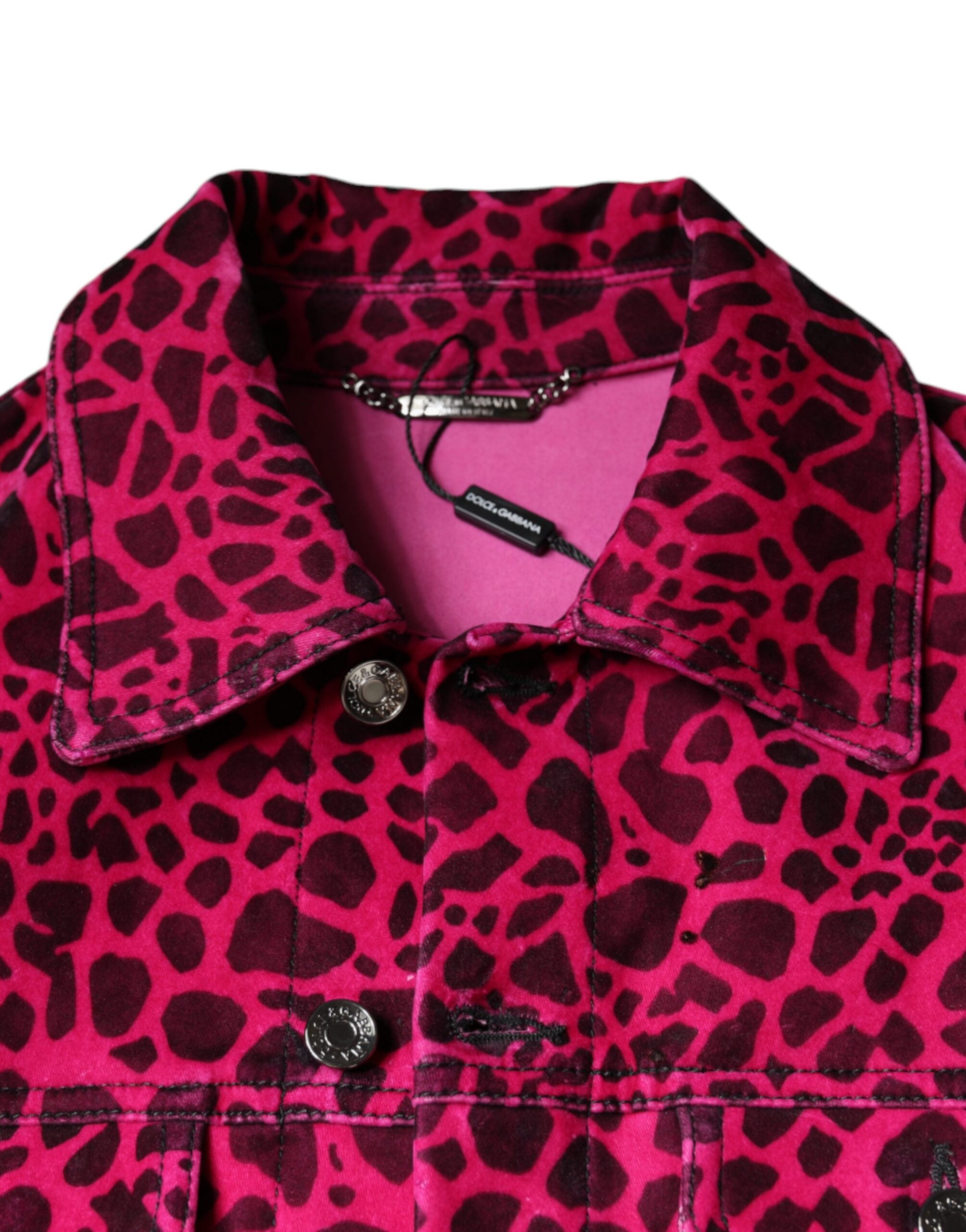 Fuchsia leopard print Dolce & Gabbana button-down collared jacket displayed on a hanger.