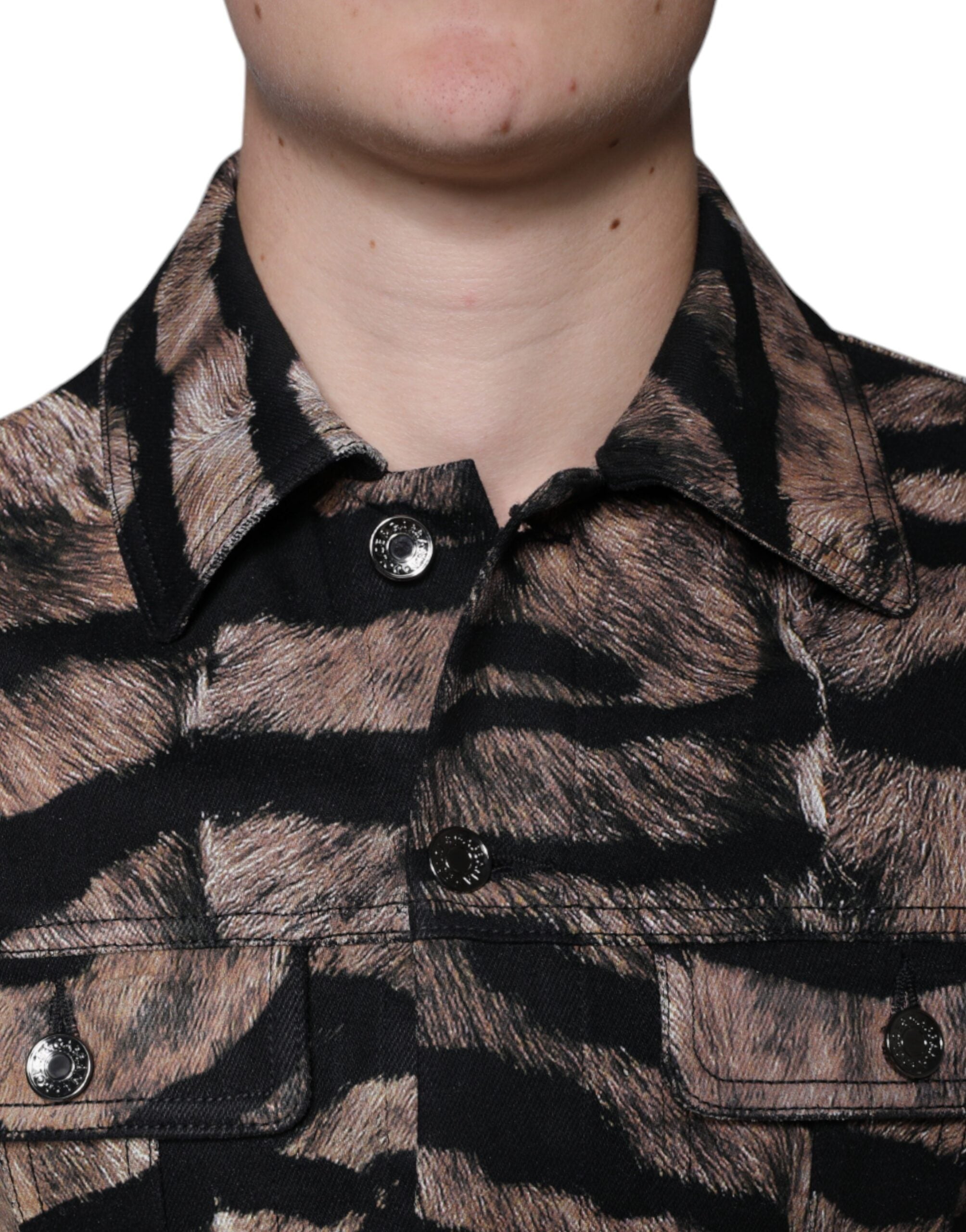 Brown tiger print button-down collared jacket by Dolce & Gabbana, showing front view with detailed tiger pattern fabric.