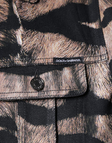Brown tiger print button-down collared jacket by Dolce & Gabbana displayed on a hanger.