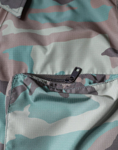 Multicolor camouflage button-down shirt by Dolce & Gabbana featuring a stylish camo pattern and classic collar.