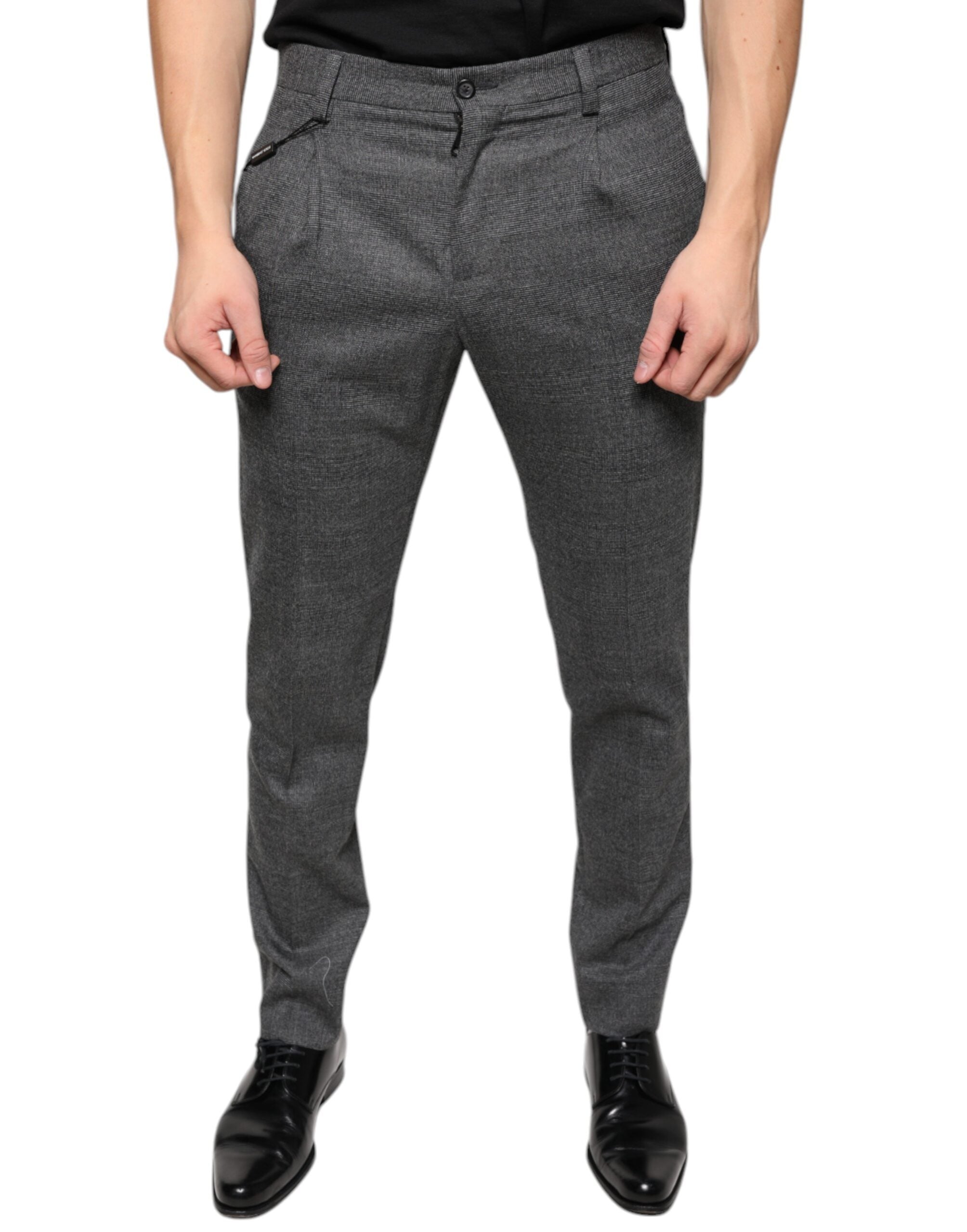Gray check tartan wool skinny pants by Dolce & Gabbana displayed on a model, showcasing tailored fit and classic pattern.