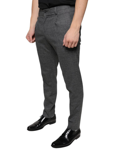 Gray check tartan wool skinny pants by Dolce & Gabbana with a fitted silhouette and classic plaid pattern.