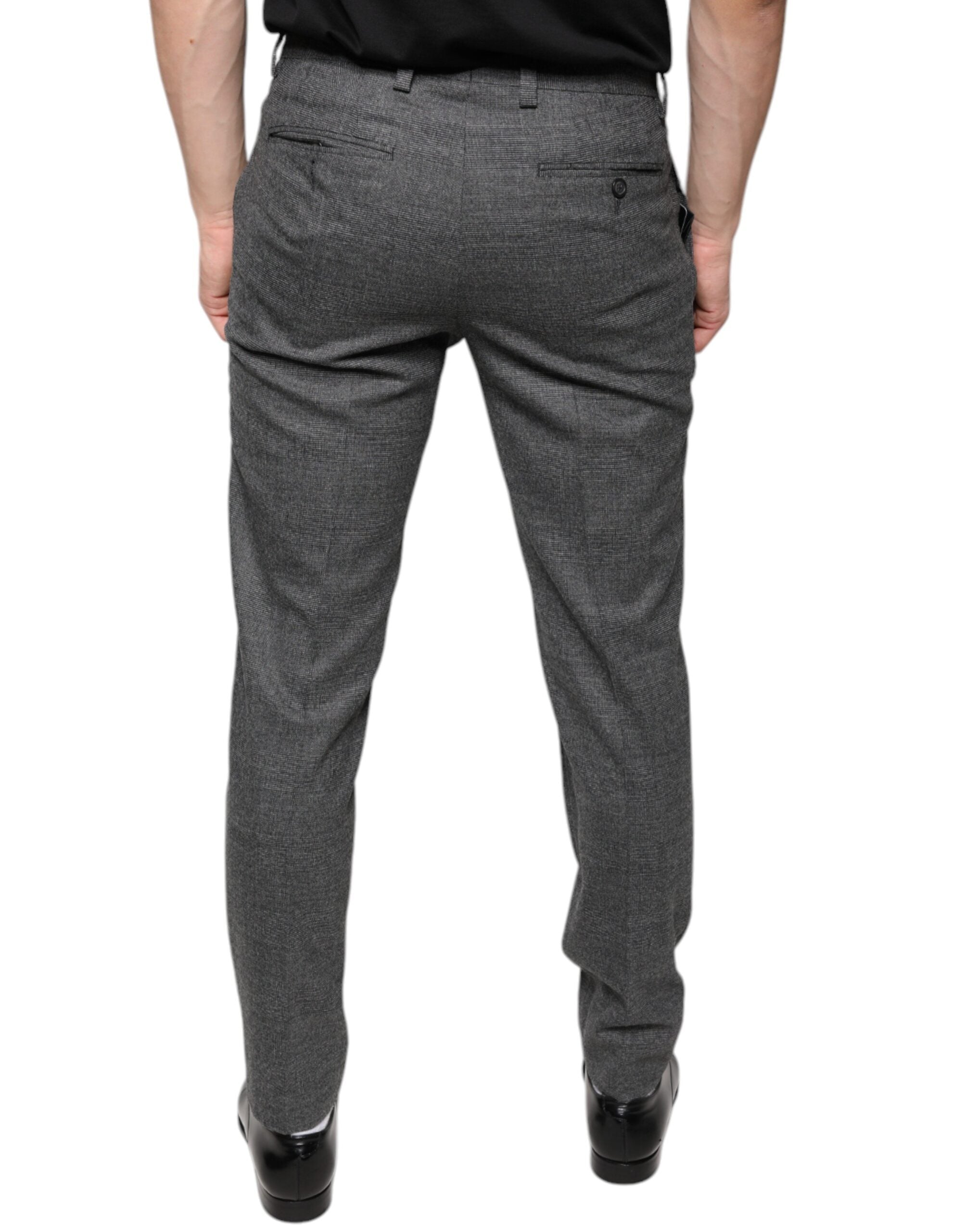 Gray check tartan wool skinny pants by Dolce & Gabbana, featuring a tailored fit and classic tartan pattern.