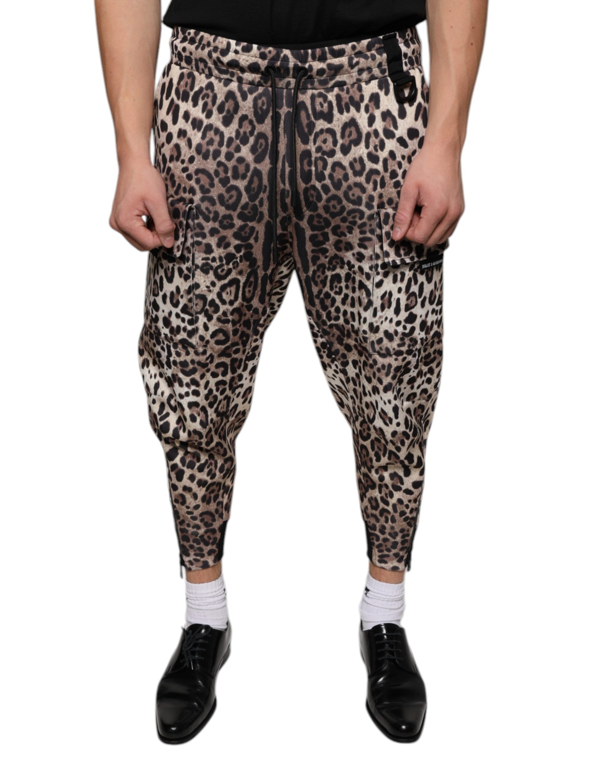 Brown leopard print polyester jogger pants by Dolce & Gabbana, featuring a relaxed fit and stylish pattern.
