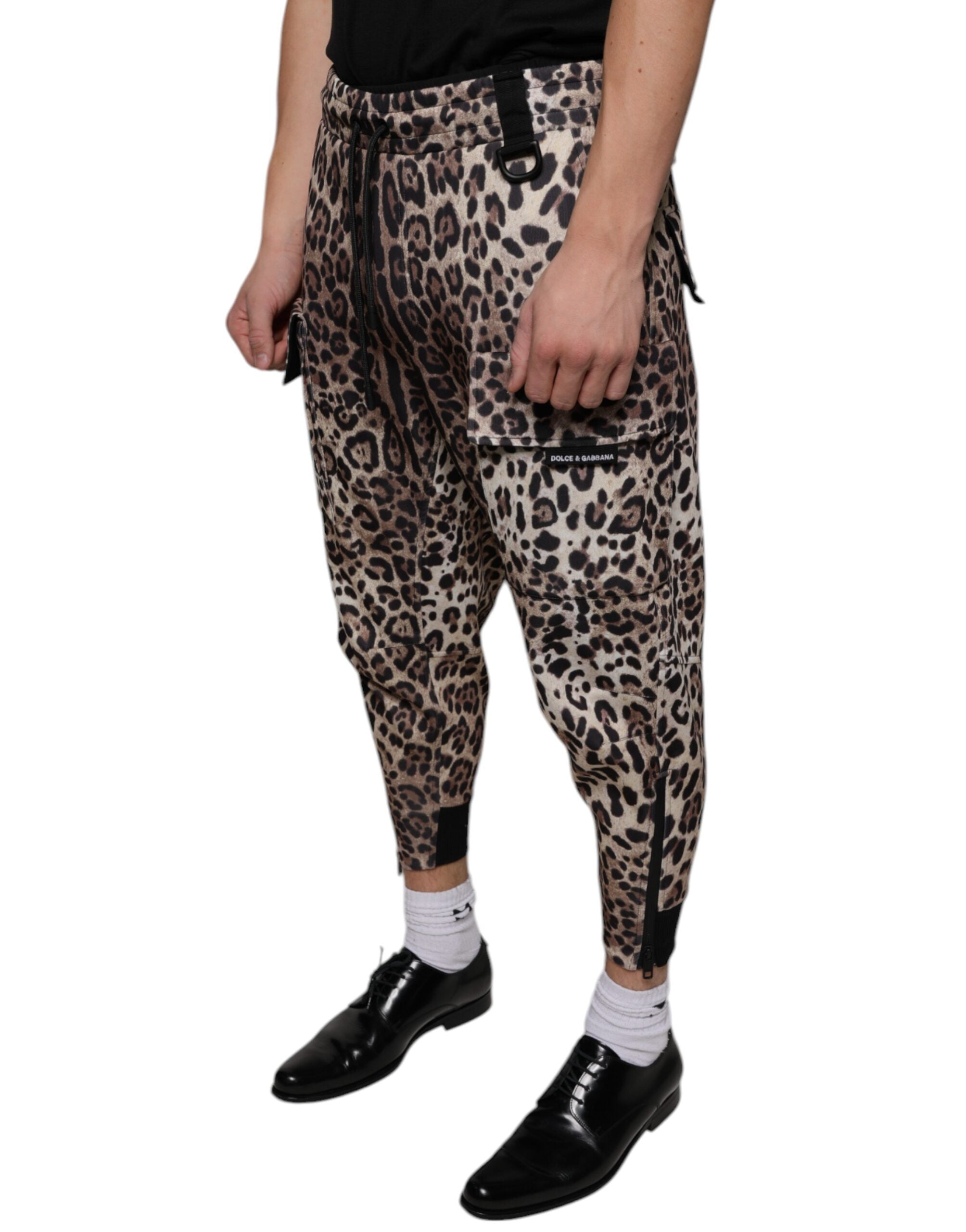 Brown leopard print polyester jogger pants by Dolce & Gabbana, featuring an elastic waistband and relaxed fit.
