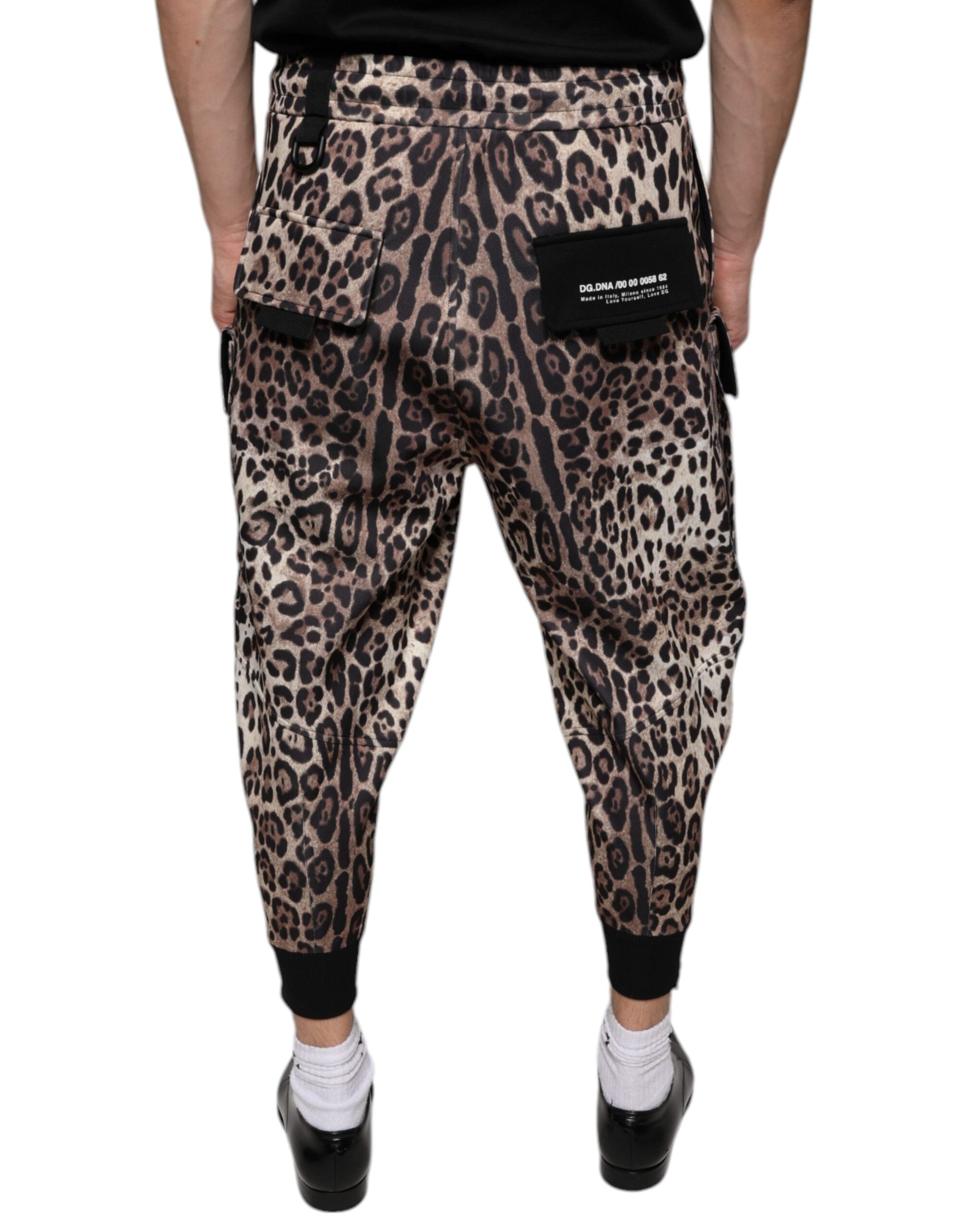 Brown leopard print polyester jogger pants by Dolce & Gabbana, featuring comfortable elastic waistband and tapered fit.
