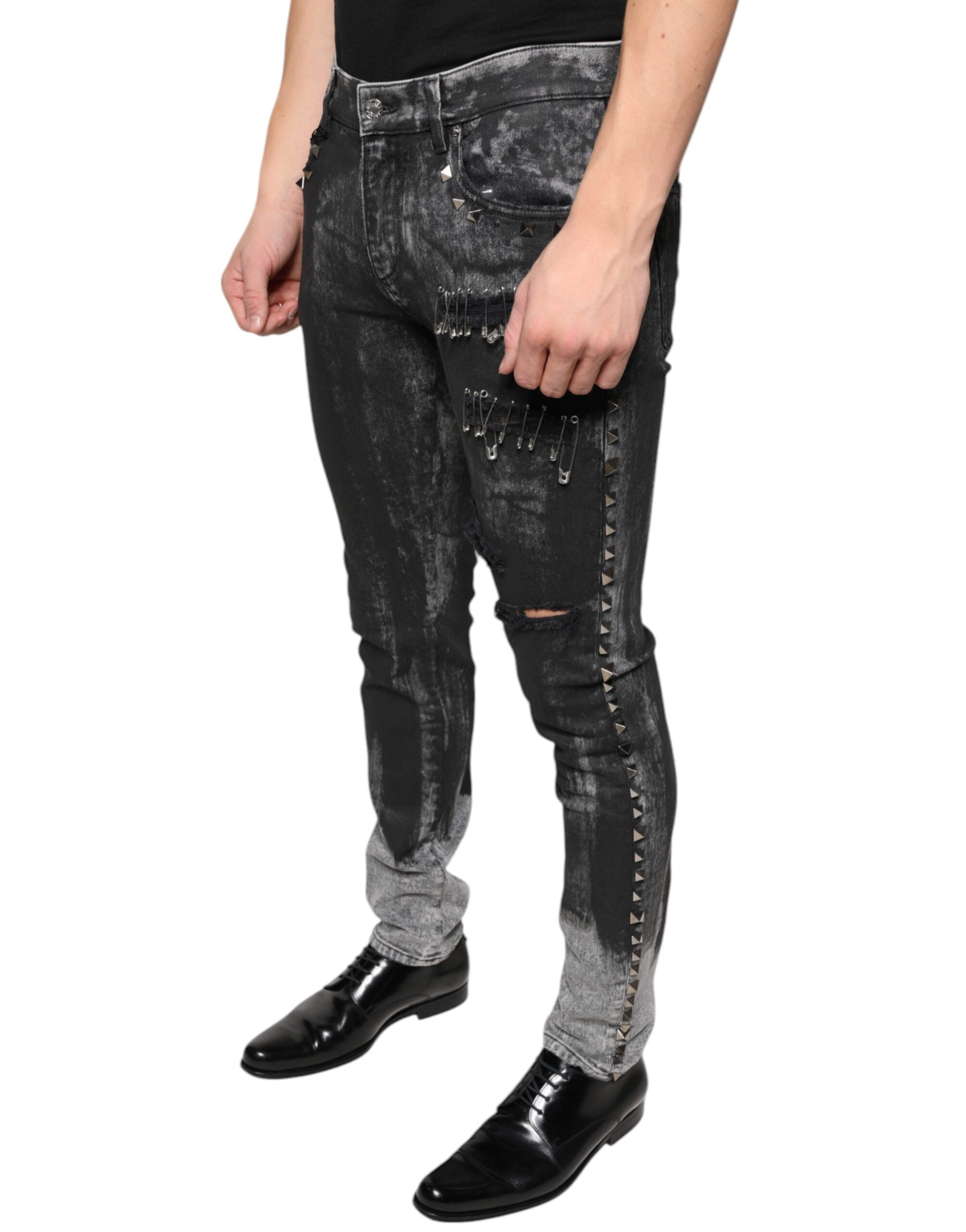 Black embellished cotton skinny denim jeans by Dolce & Gabbana with decorative details and a fitted silhouette.