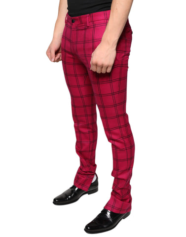 Pink checkered wool skinny pants by Dolce & Gabbana displayed on a model, showcasing tailored fit and stylish pattern.