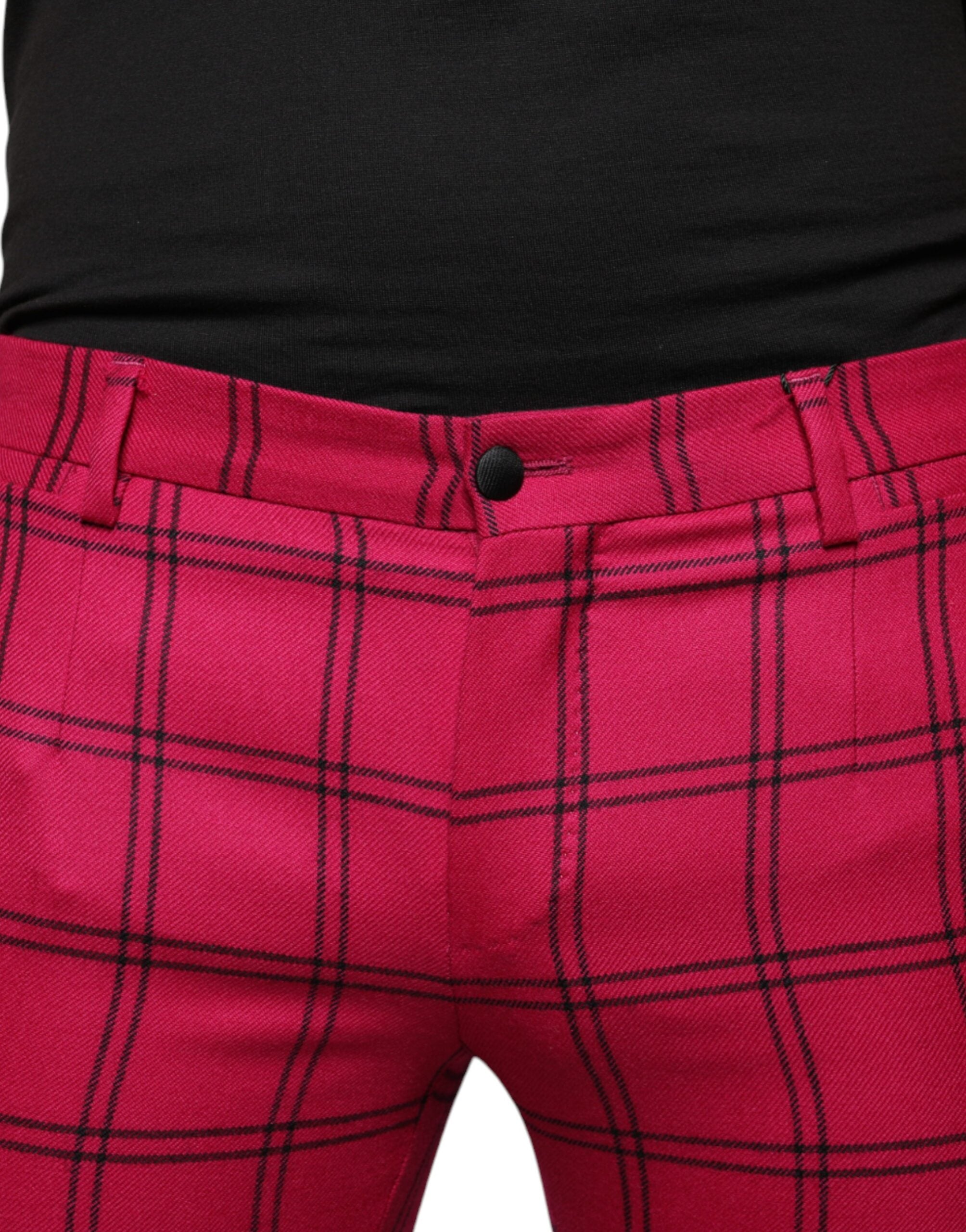 Pink checkered wool skinny pants by Dolce & Gabbana, close-up of tailored fit and stylish pattern.