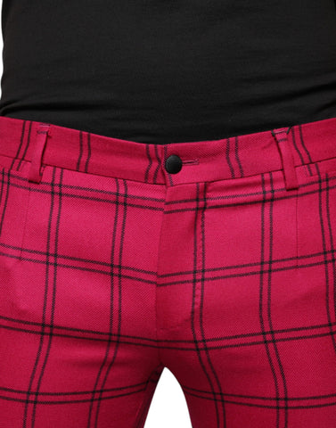 Pink checkered wool skinny pants by Dolce & Gabbana, close-up of tailored fit and stylish pattern.
