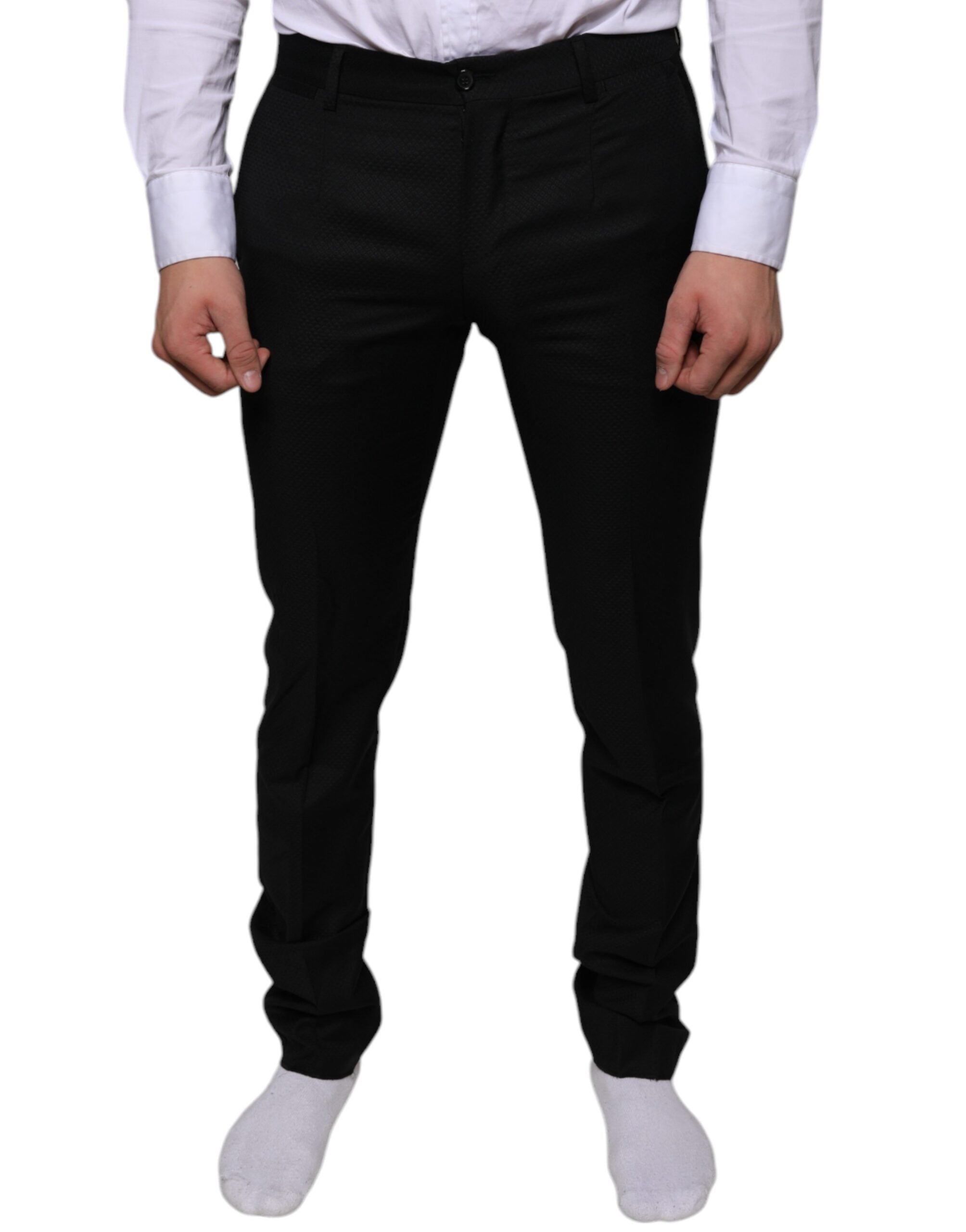 Black wool skinny dress pants by Dolce & Gabbana, tailored formal pants with a sleek, fitted design.
