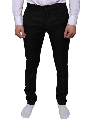 Black wool skinny dress pants by Dolce & Gabbana, tailored formal pants with a sleek, fitted design.