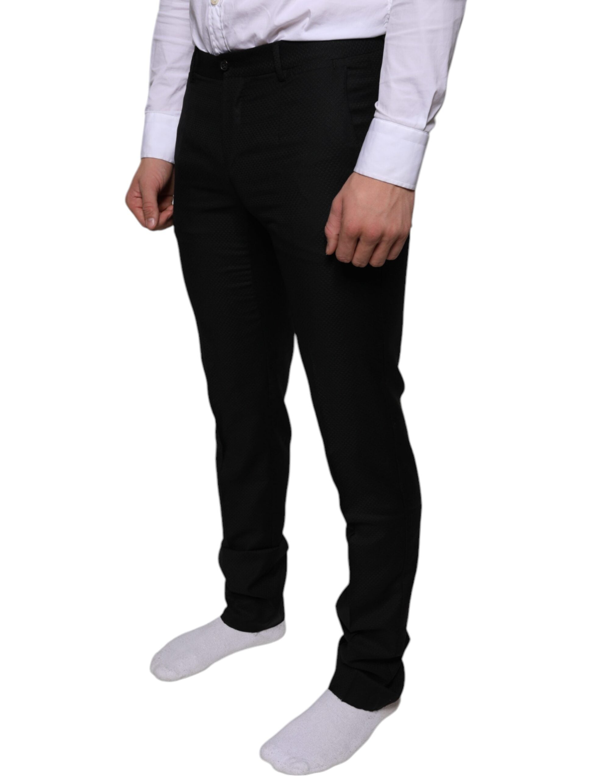 Black wool skinny dress pants by Dolce & Gabbana, tailored formal pants with a sleek, fitted silhouette.