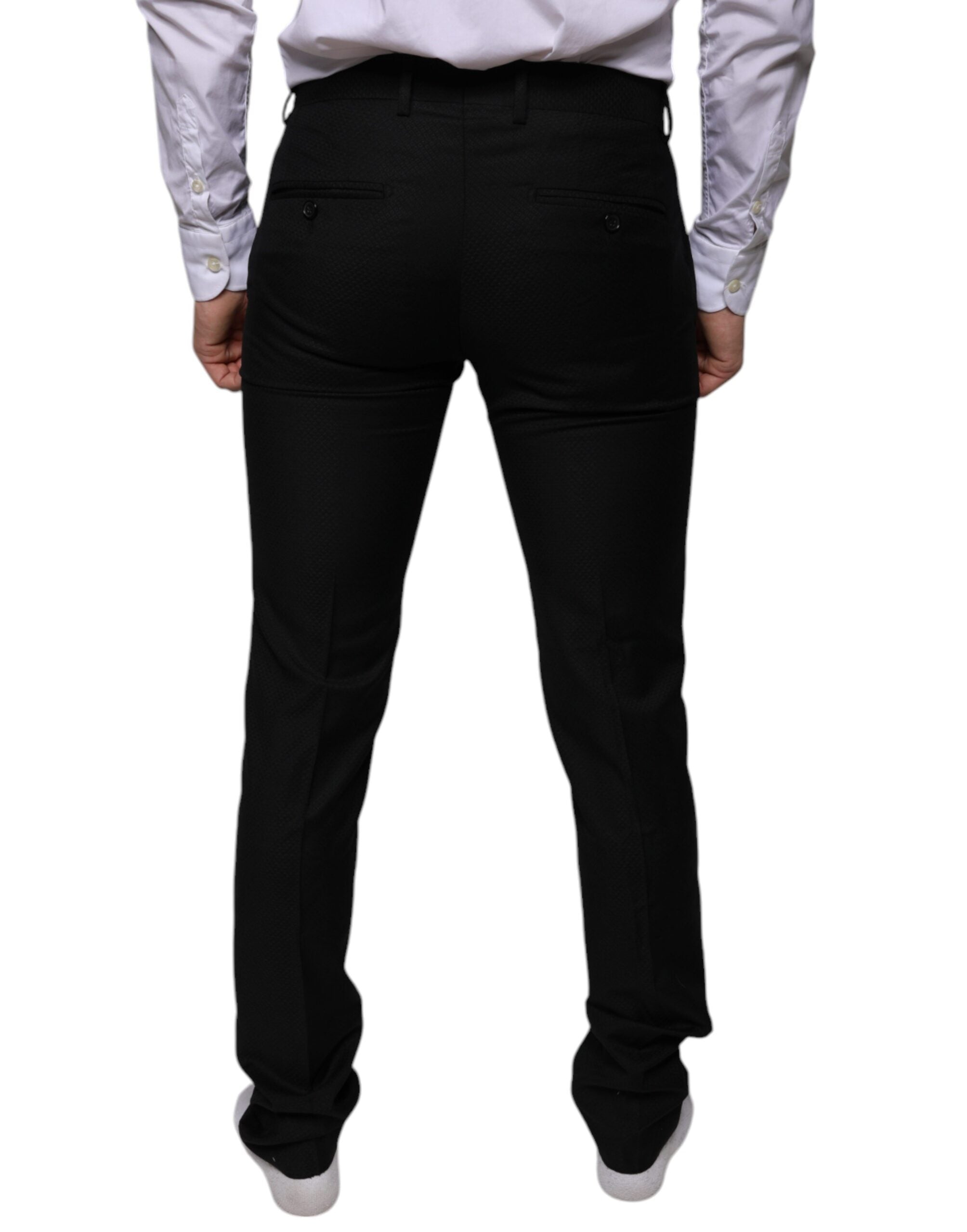 Black wool skinny dress pants by Dolce & Gabbana, tailored formal trousers with a sleek, fitted design.