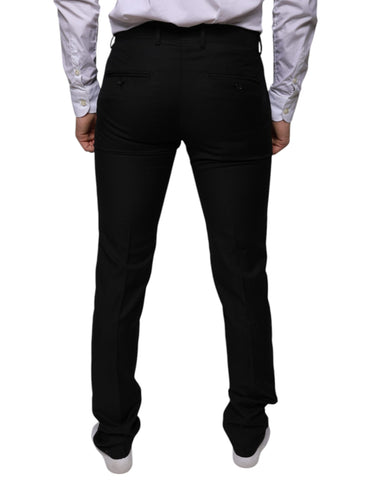 Black wool skinny dress pants by Dolce & Gabbana, tailored formal trousers with a sleek, fitted design.