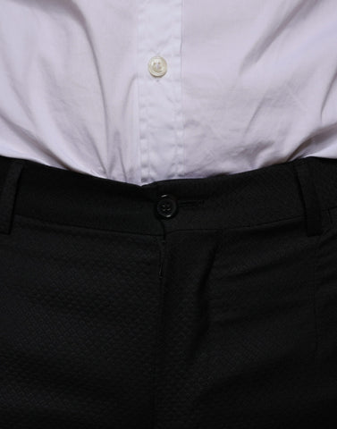 Black wool skinny dress pants by Dolce & Gabbana, tailored formal pants with a slim fit and sleek design.