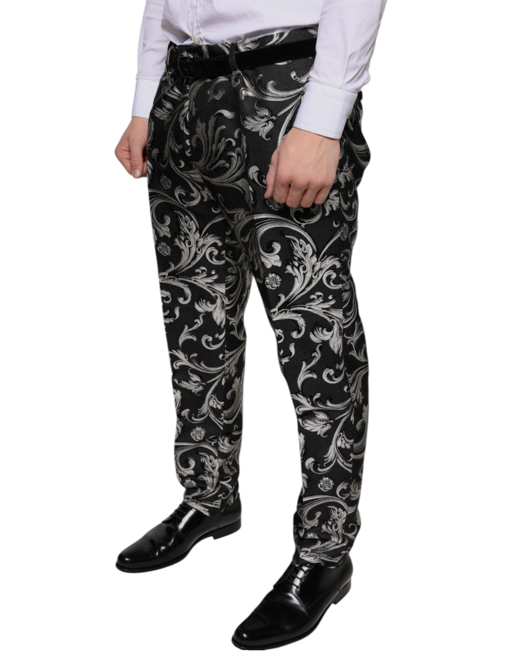 Black Jacquard skinny dress pants by Dolce & Gabbana, showing tailored fit and intricate woven pattern.