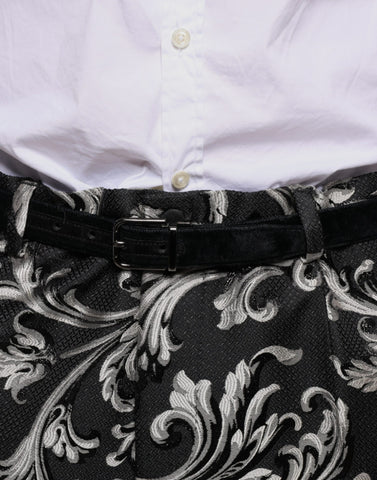 Black Jacquard skinny dress pants by Dolce & Gabbana with a tailored fit and intricate woven pattern.