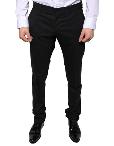 Black wool skinny dress pants by Dolce & Gabbana, tailored formal trousers with a sleek, fitted silhouette.