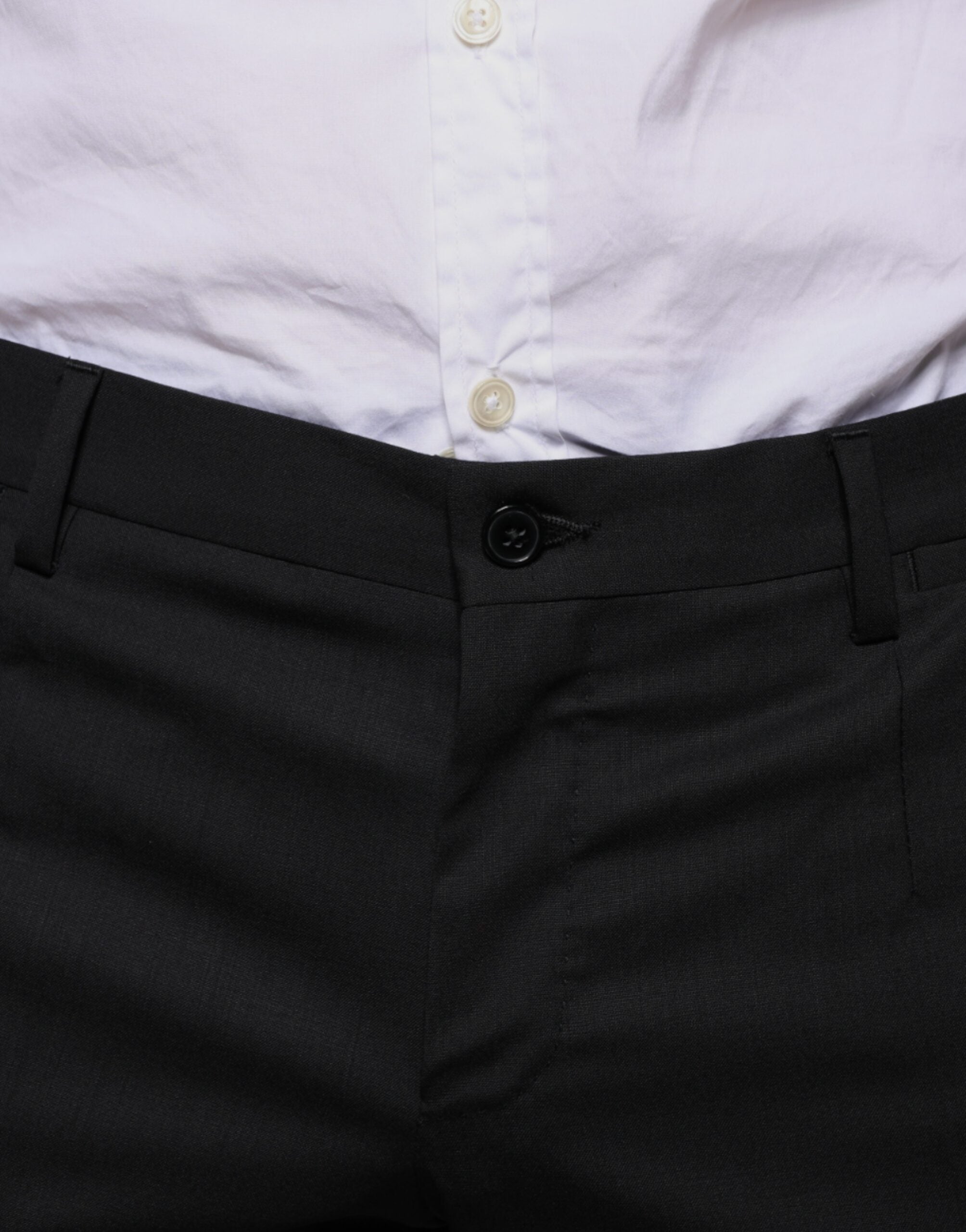 Black wool skinny dress pants by Dolce & Gabbana, formal women's trousers with a sleek, tailored fit.