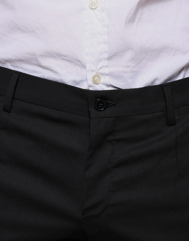 Black wool skinny dress pants by Dolce & Gabbana, formal women's trousers with a sleek, tailored fit.