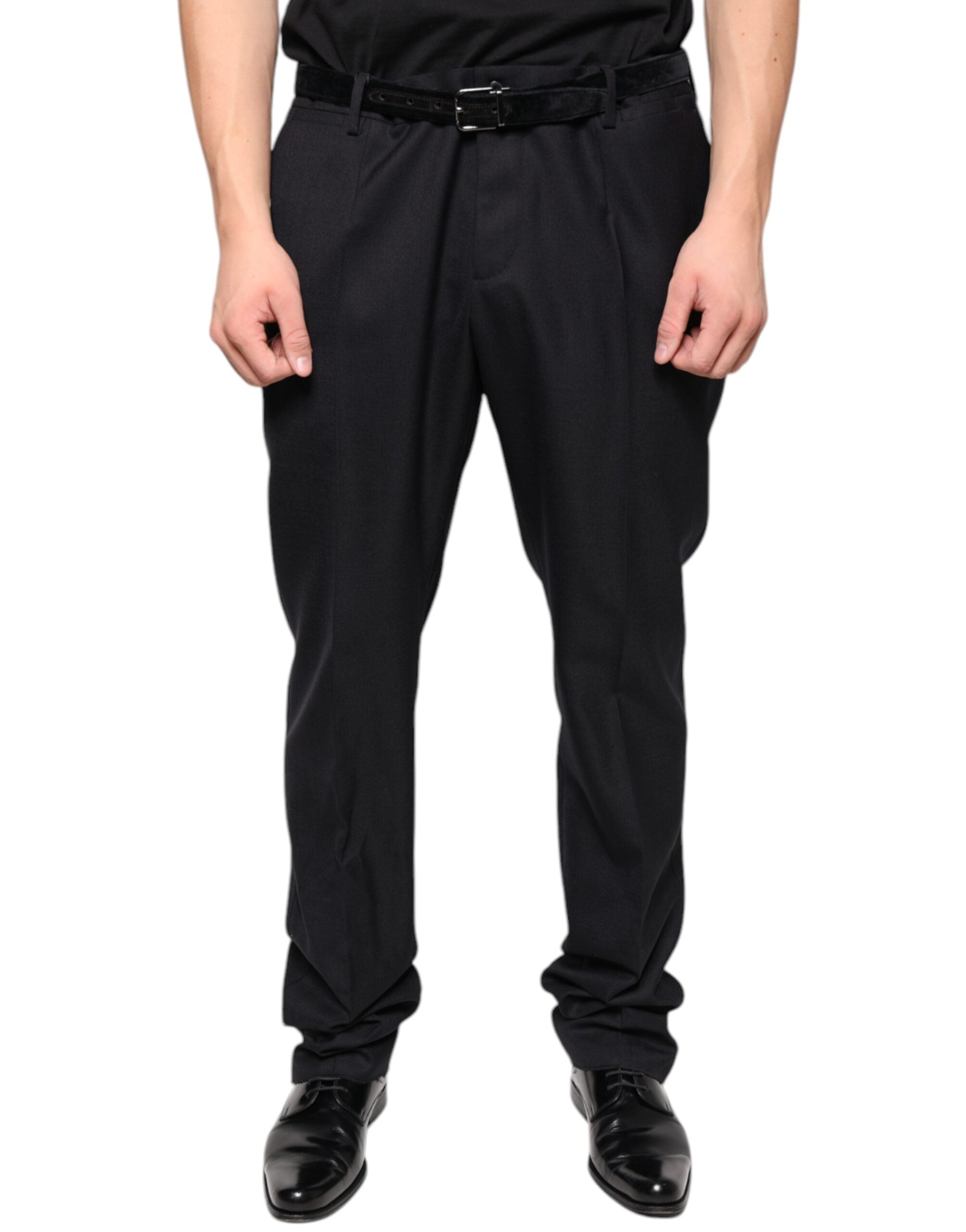 Black wool skinny dress pants by Dolce & Gabbana, formal trousers with a sleek fit and tailored design.