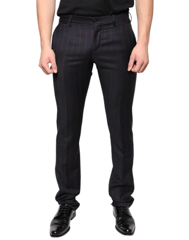 Black striped skinny men's dress pants by Dolce & Gabbana, tailored fit with sleek design, shown on a model.